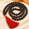 Black Rudraksha mala with red tassel — edited product visual