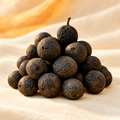 Dried Rudraksha fruits — edited product visual
